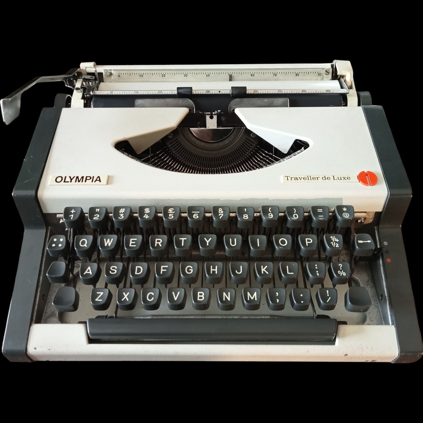 Image of Olympia Traveller De Luxe Typewriter. Available from universaltypewritercompany.in