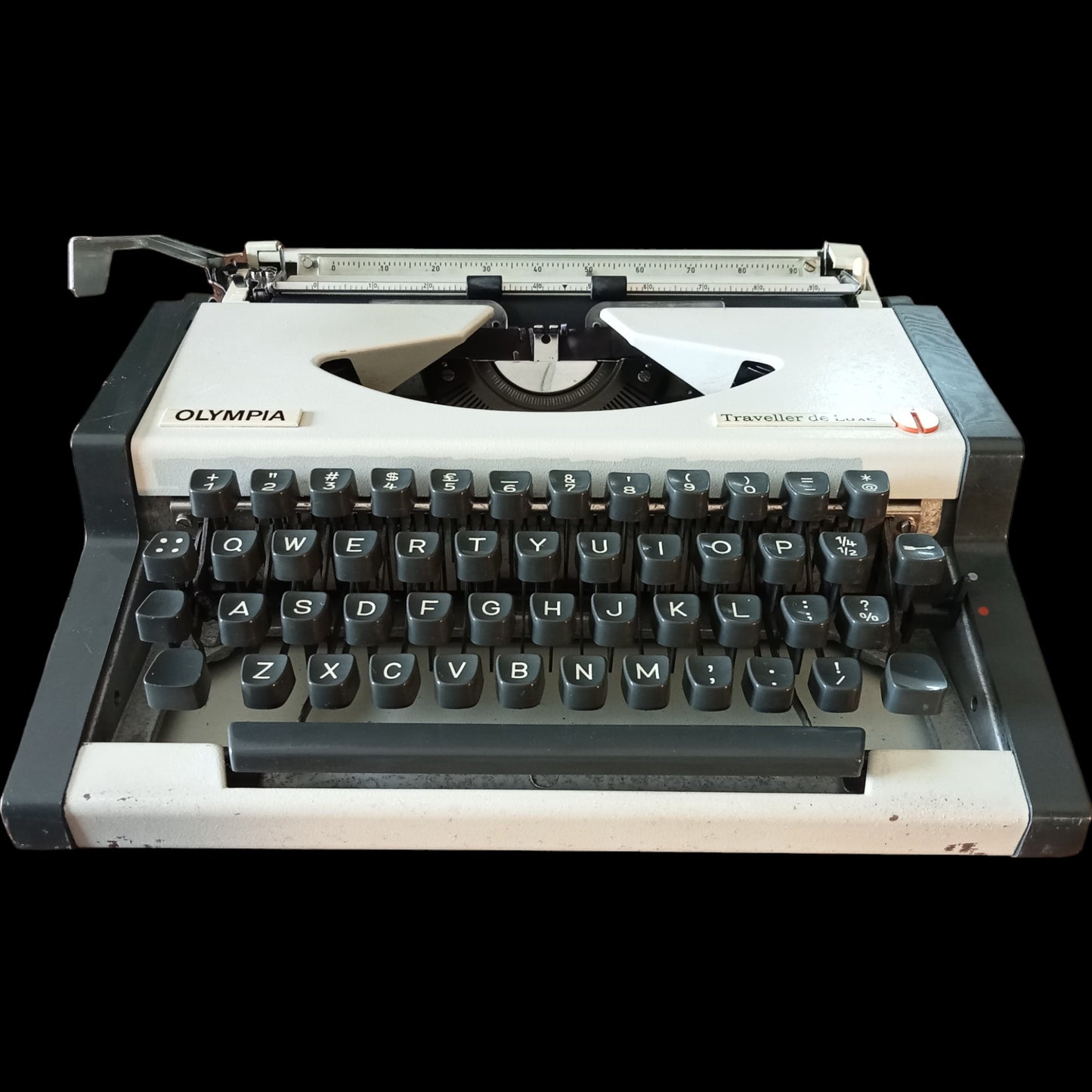 Image of Olympia Traveller De Luxe Typewriter. Available from universaltypewritercompany.in