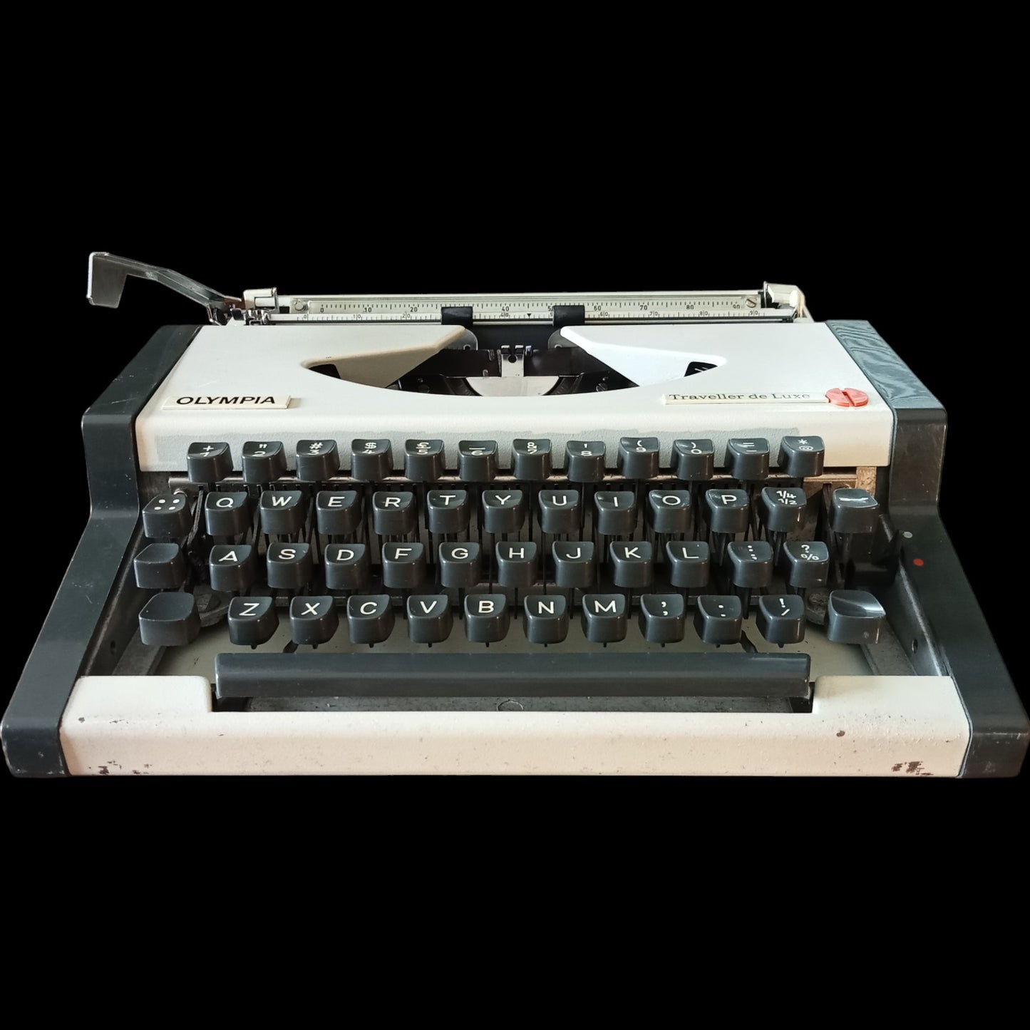 Image of Olympia Traveller De Luxe Typewriter. Available from universaltypewritercompany.in