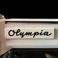 Image of Olympia Traveller De Luxe Typewriter. Available from universaltypewritercompany.in