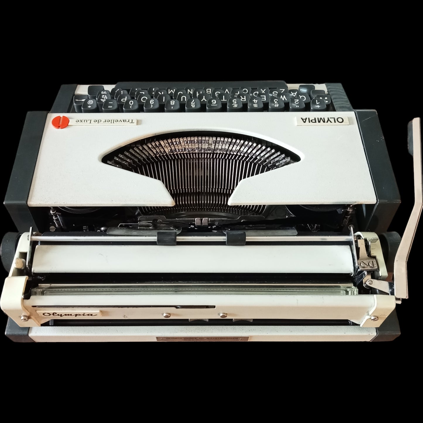 Image of Olympia Traveller De Luxe Typewriter. Available from universaltypewritercompany.in