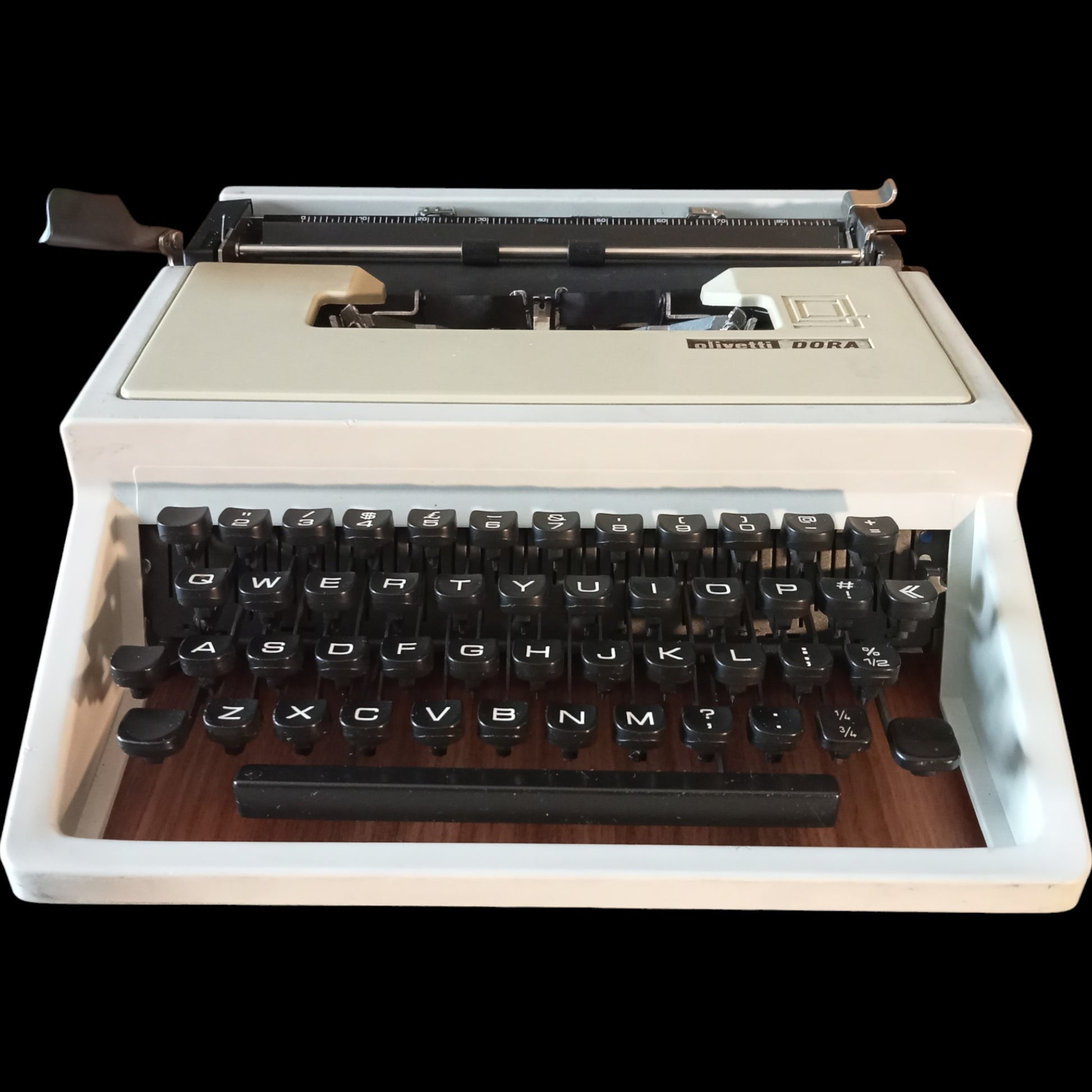 Image of Olivetti Dora Typewriter. Available from universaltypewritercompany.in