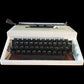 Image of Olivetti Dora Typewriter. Available from universaltypewritercompany.in