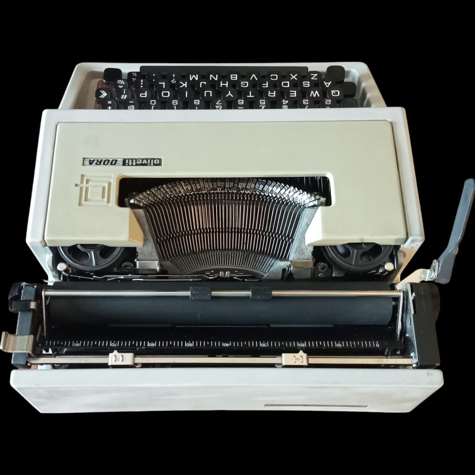 Image of Olivetti Dora Typewriter. Available from universaltypewritercompany.in