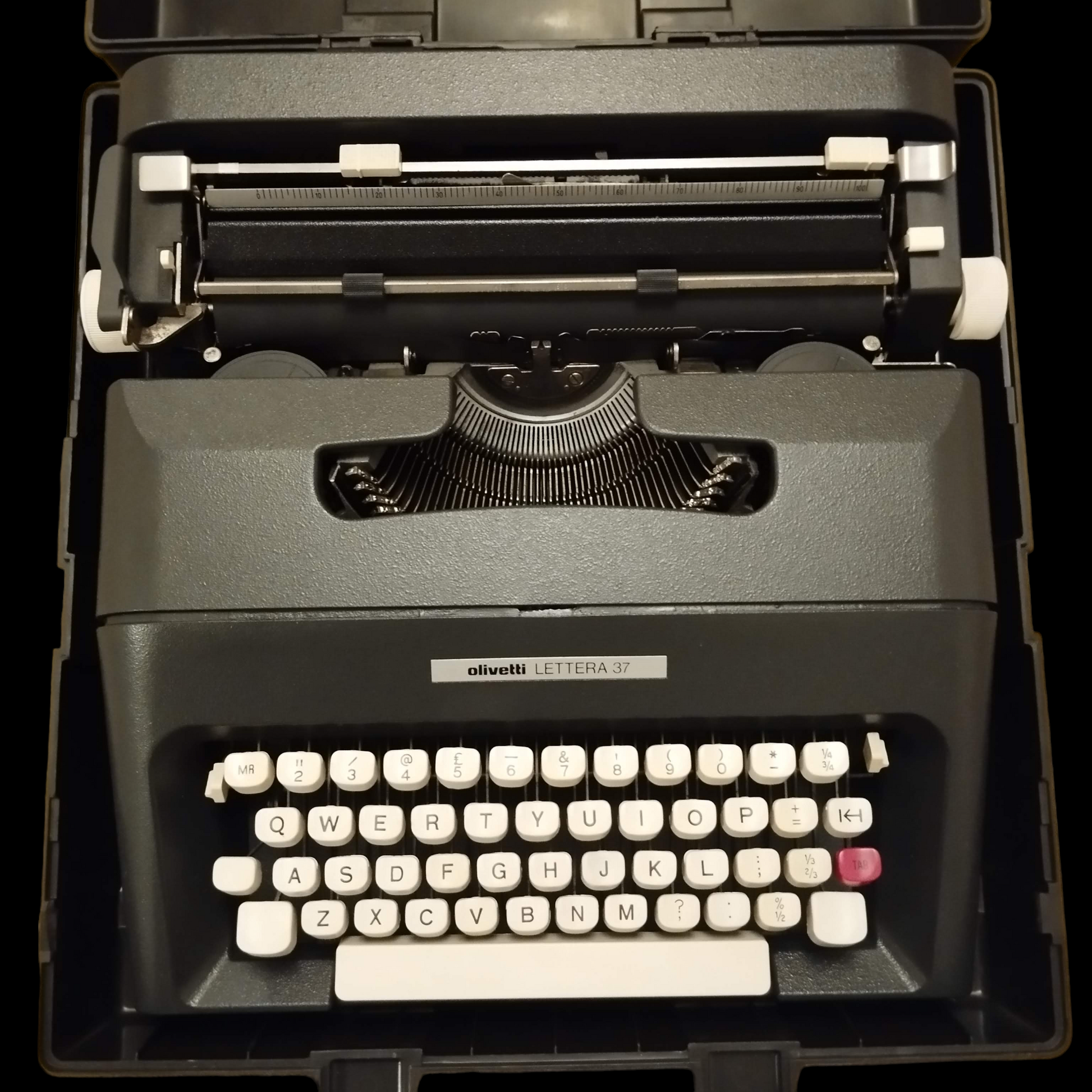 Image of Olivetti Lettera 37 Typewriter. Portable Typewriter. Made in Europe. Available with cover. Available from universaltypewritercompany.in