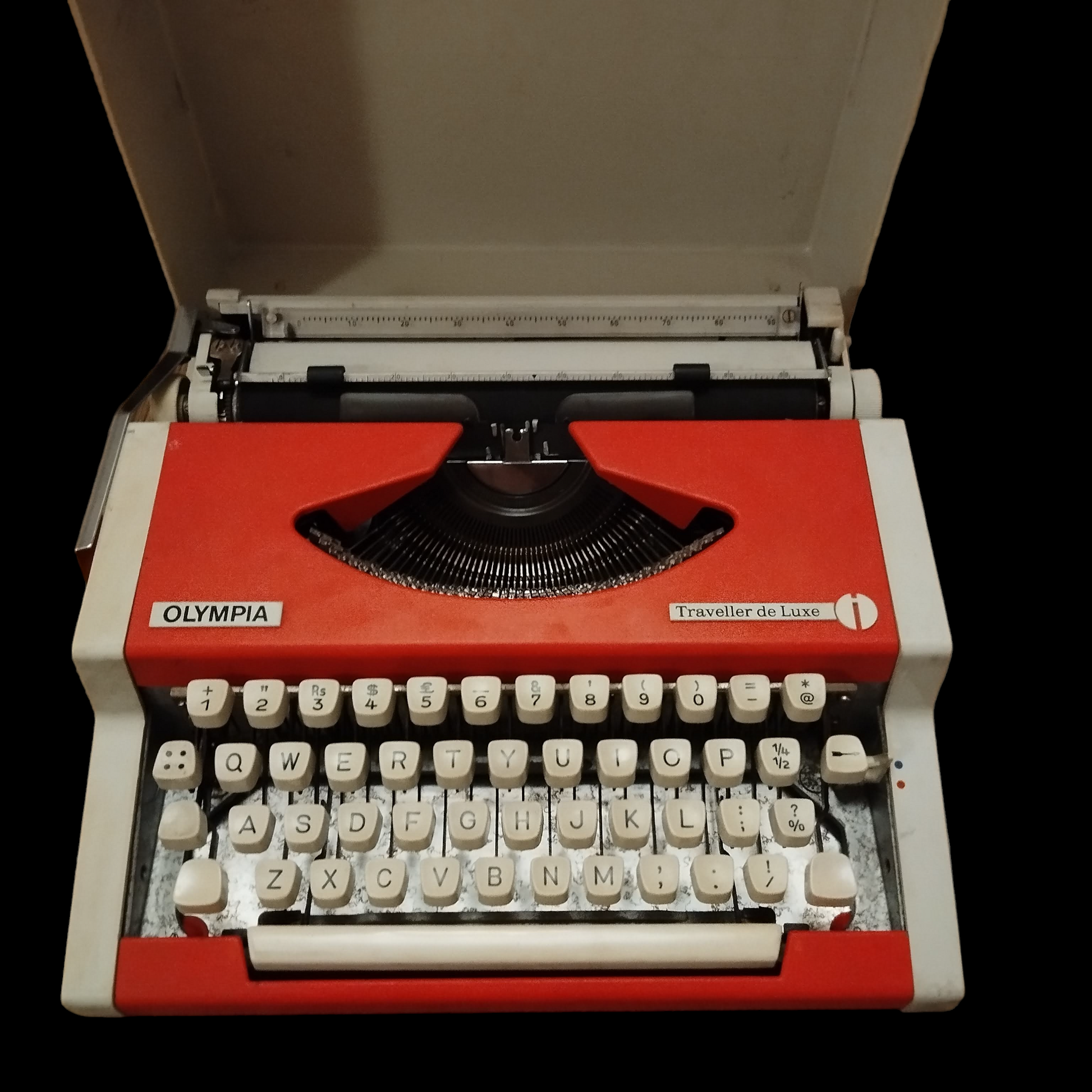 Image of Olympia Traveller de Luxe Typewriter. Available from universaltypewritercompany.in