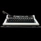 Image of Erika Typewriter. Portable Typewriter. Made in Germany. Available from universaltypewritercompany.in