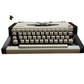 Image of Olympia Traveller de Luxe Typewriter. Available from universaltypewritercompany.in