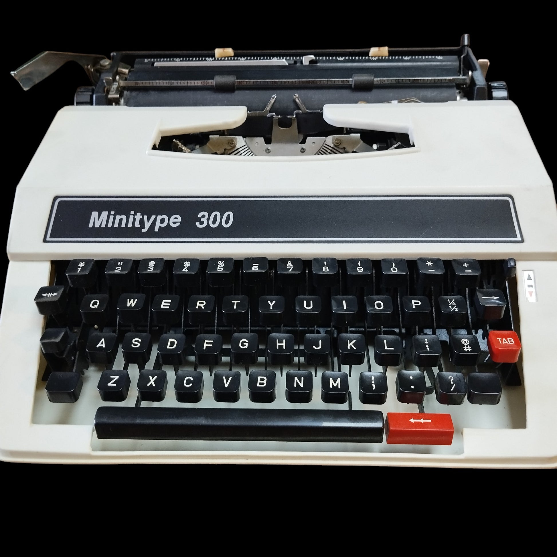 Image of Minitype 300 Typewriter. Available from universaltypewritercompany.in