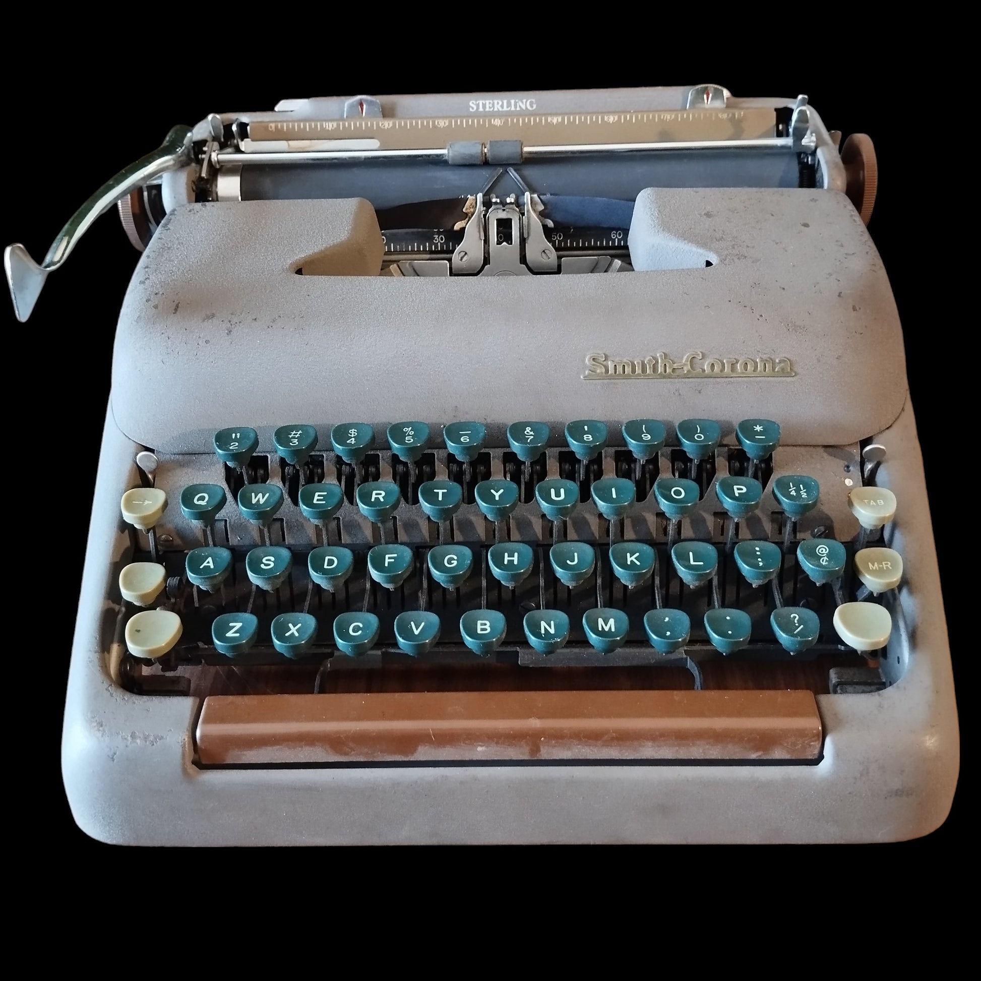 Image of Smith Corona Sterling Typewriter. A Classic Portable typewriter. Made in the USA. Available from Universal Typewriter Company.