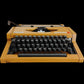 Image of Olympia Traveller De Luxe Typewriter. Available from universaltypewritercompany.in