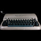 Image of Remington Personal Portable Typewriter. Available from universaltypewritercompany.in