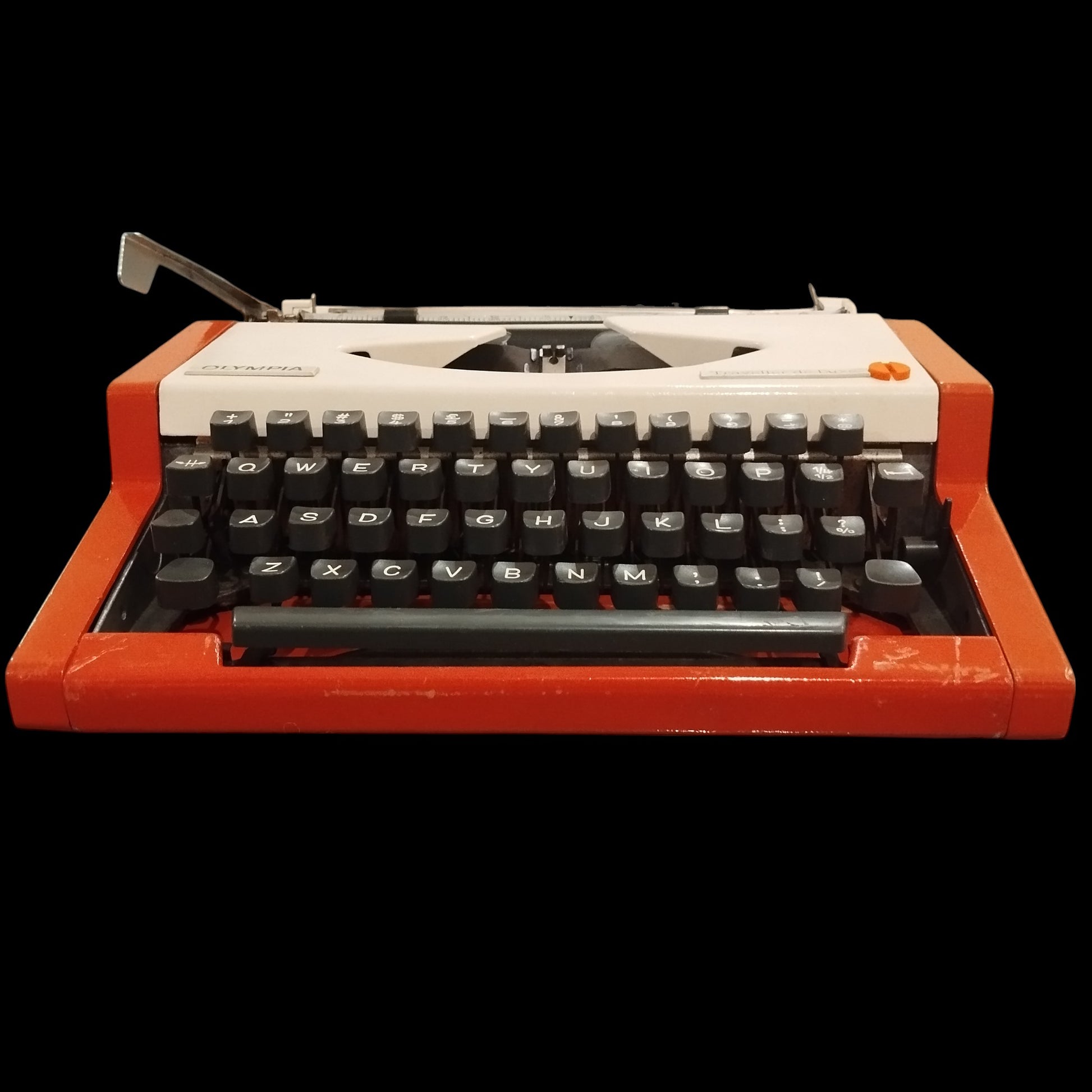 Image of Olympia Traveller De Luxe Typewriter. Available from universaltypewritercompany.in