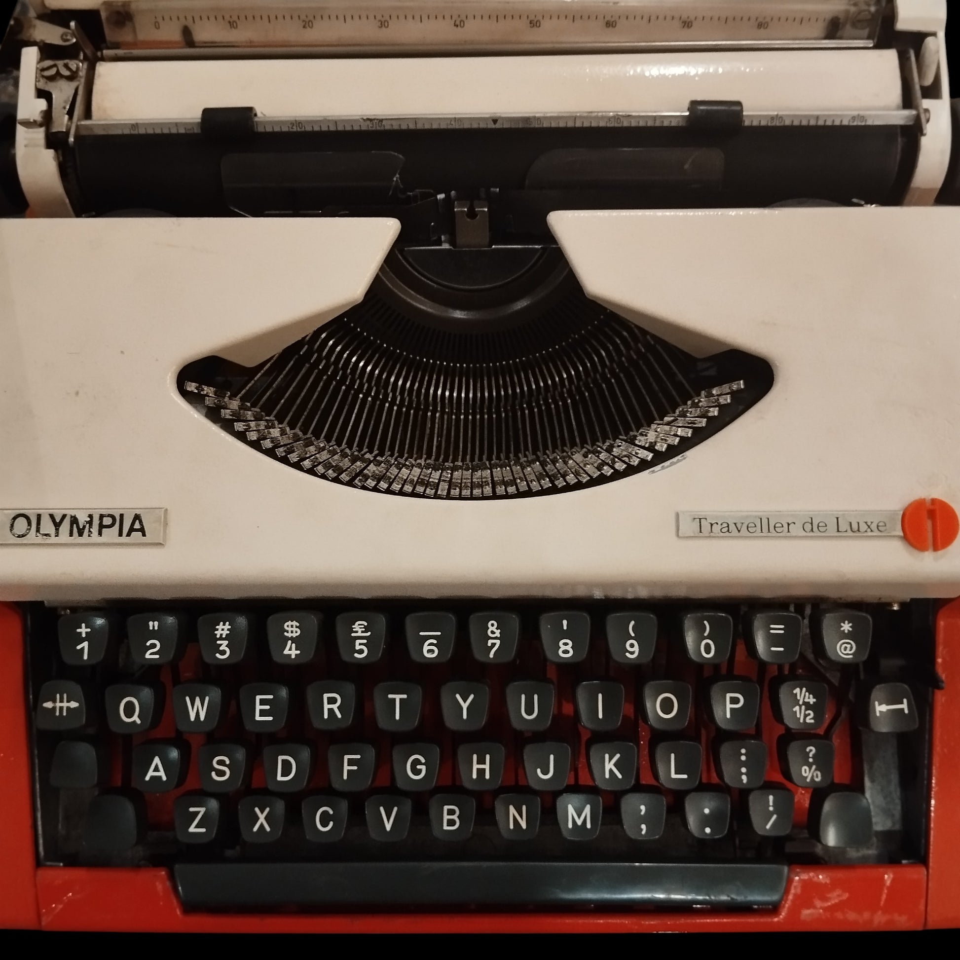 Image of Olympia Traveller De Luxe Typewriter. Available from universaltypewritercompany.in