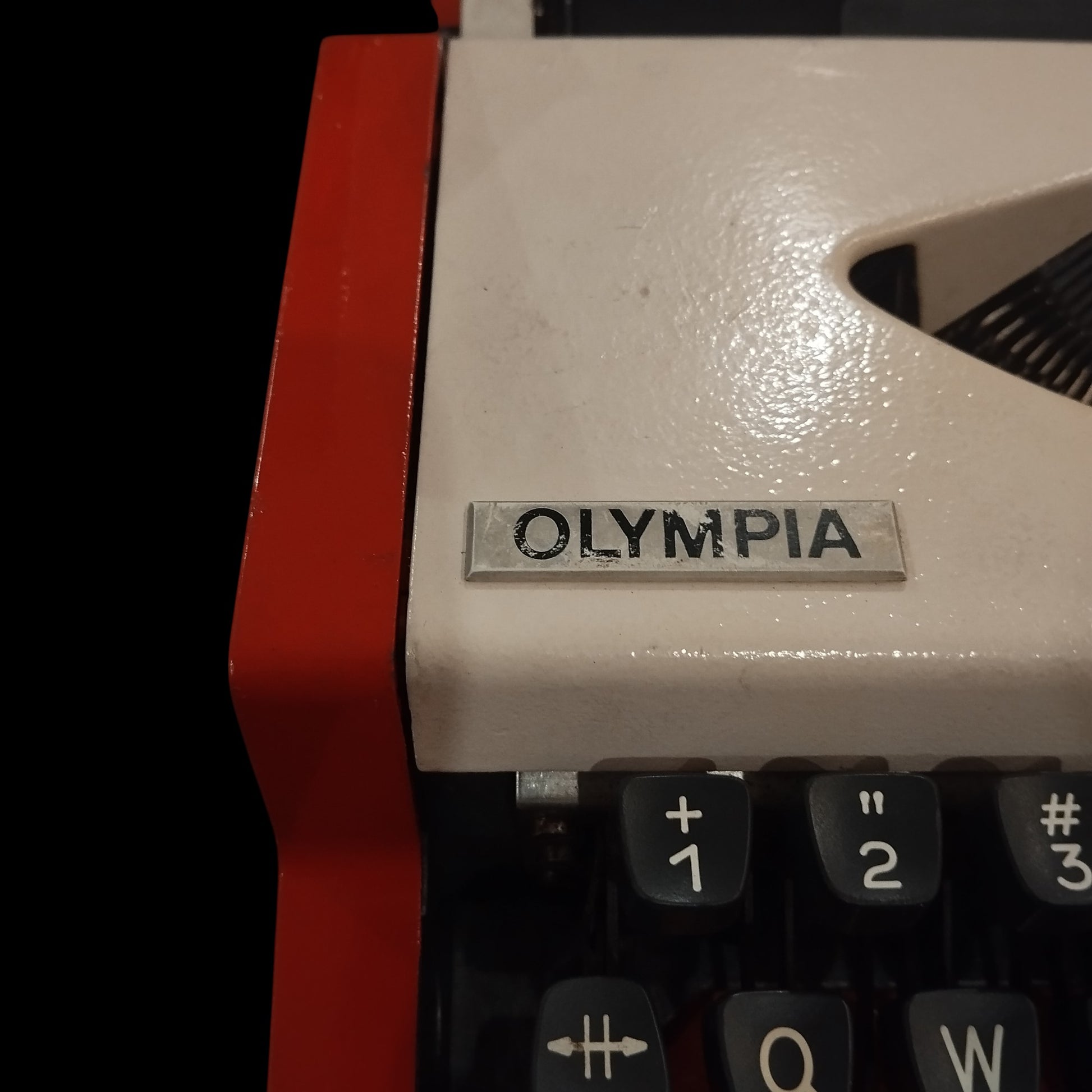 Image of Olympia Traveller De Luxe Typewriter. Available from universaltypewritercompany.in