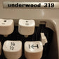 Close-up of a vintage Underwood 319 typewriter with key details. Image of Underwood 319 Typewriter. Available from universaltypewritercompany.in