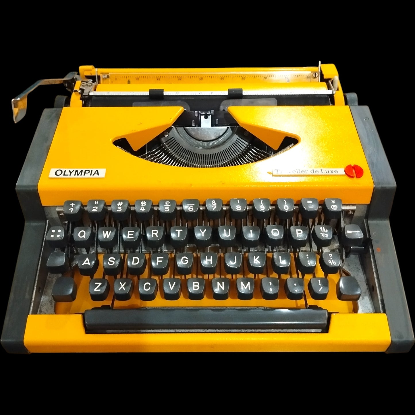 Image of Olympia Traveller De Luxe Typewriter. Available from universaltypewritercompany.in