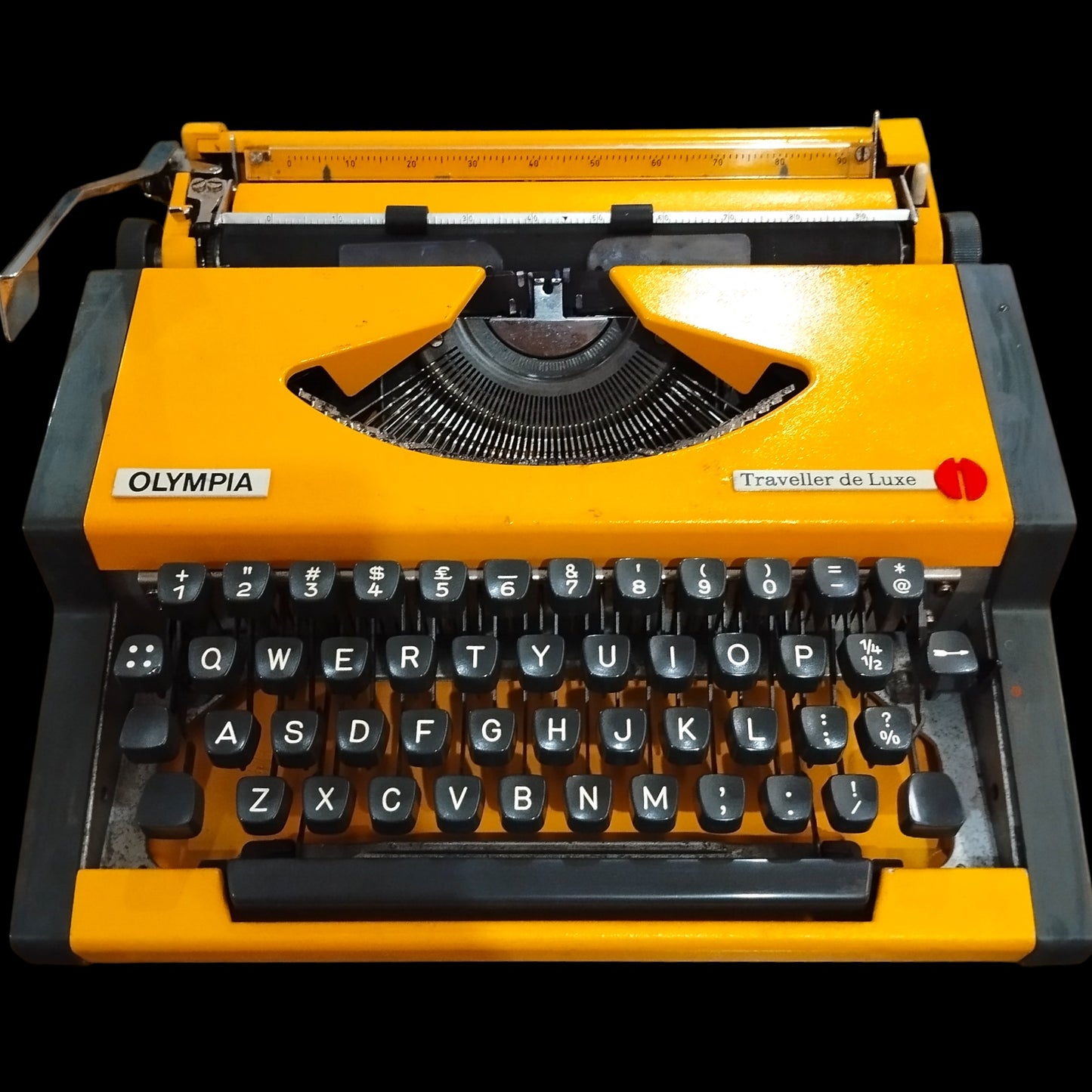 Image of Olympia Traveller De Luxe Typewriter. Available from universaltypewritercompany.in
