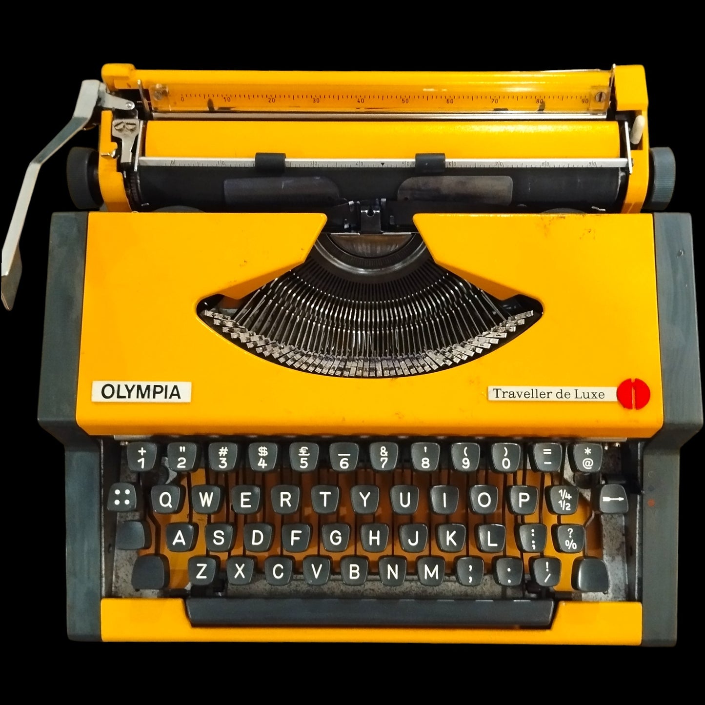 Image of Olympia Traveller De Luxe Typewriter. Available from universaltypewritercompany.in
