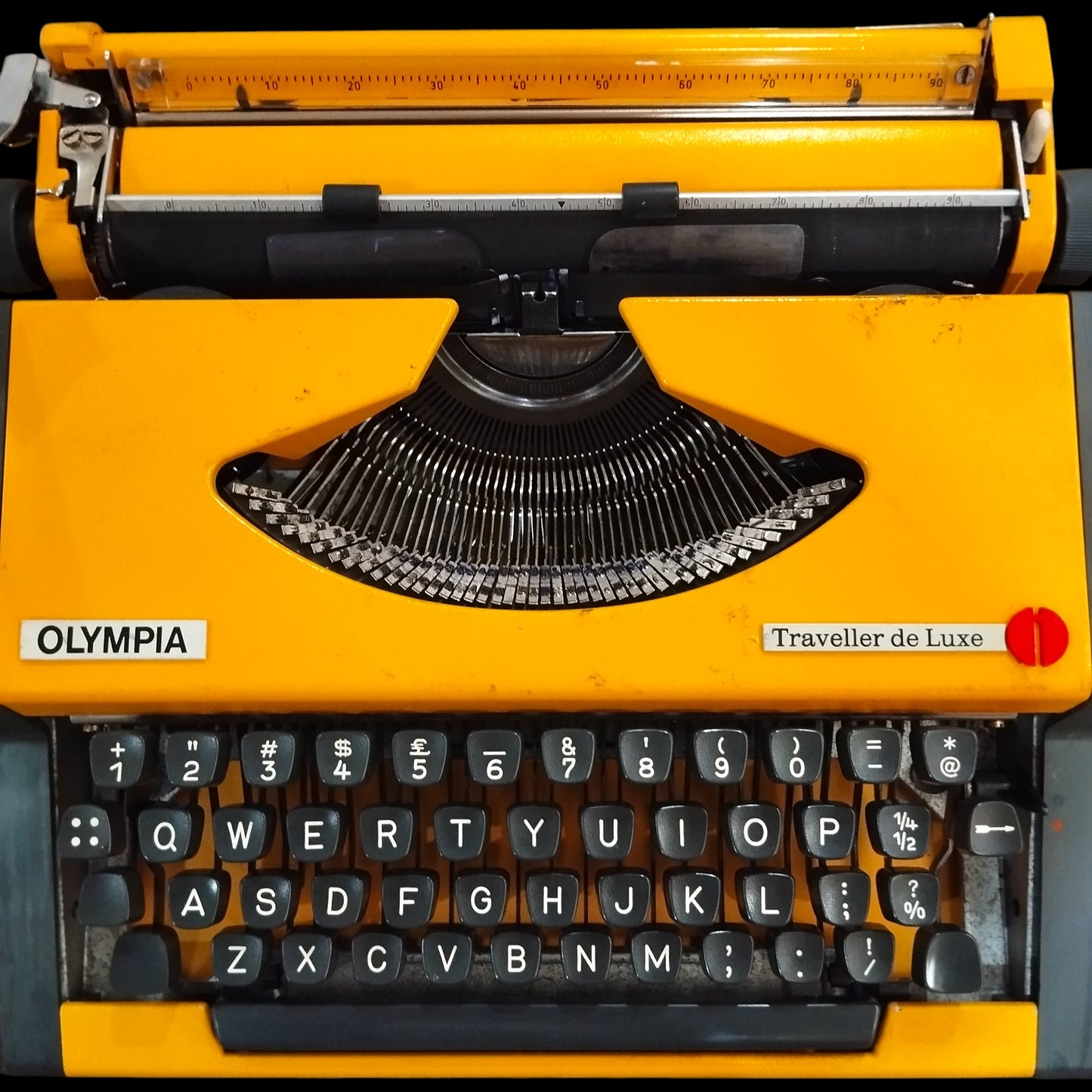 Image of Olympia Traveller De Luxe Typewriter. Available from universaltypewritercompany.in