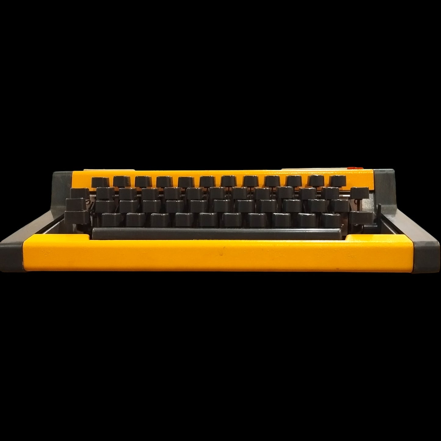 Image of Olympia Traveller De Luxe Typewriter. Available from universaltypewritercompany.in