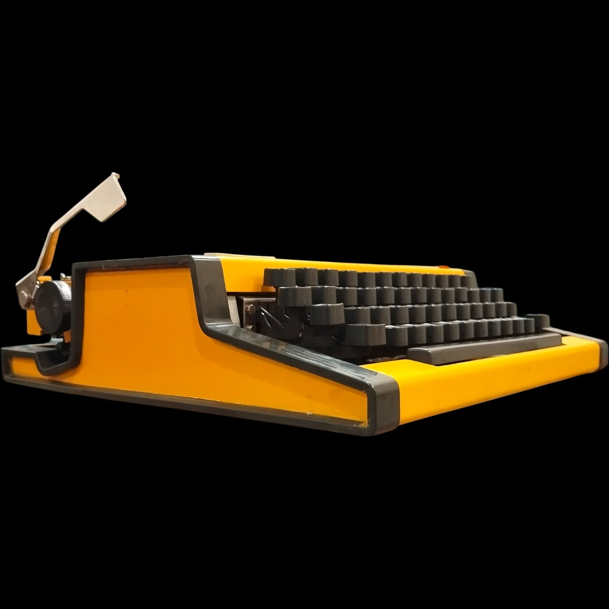 Image of Olympia Traveller De Luxe Typewriter. Available from universaltypewritercompany.in