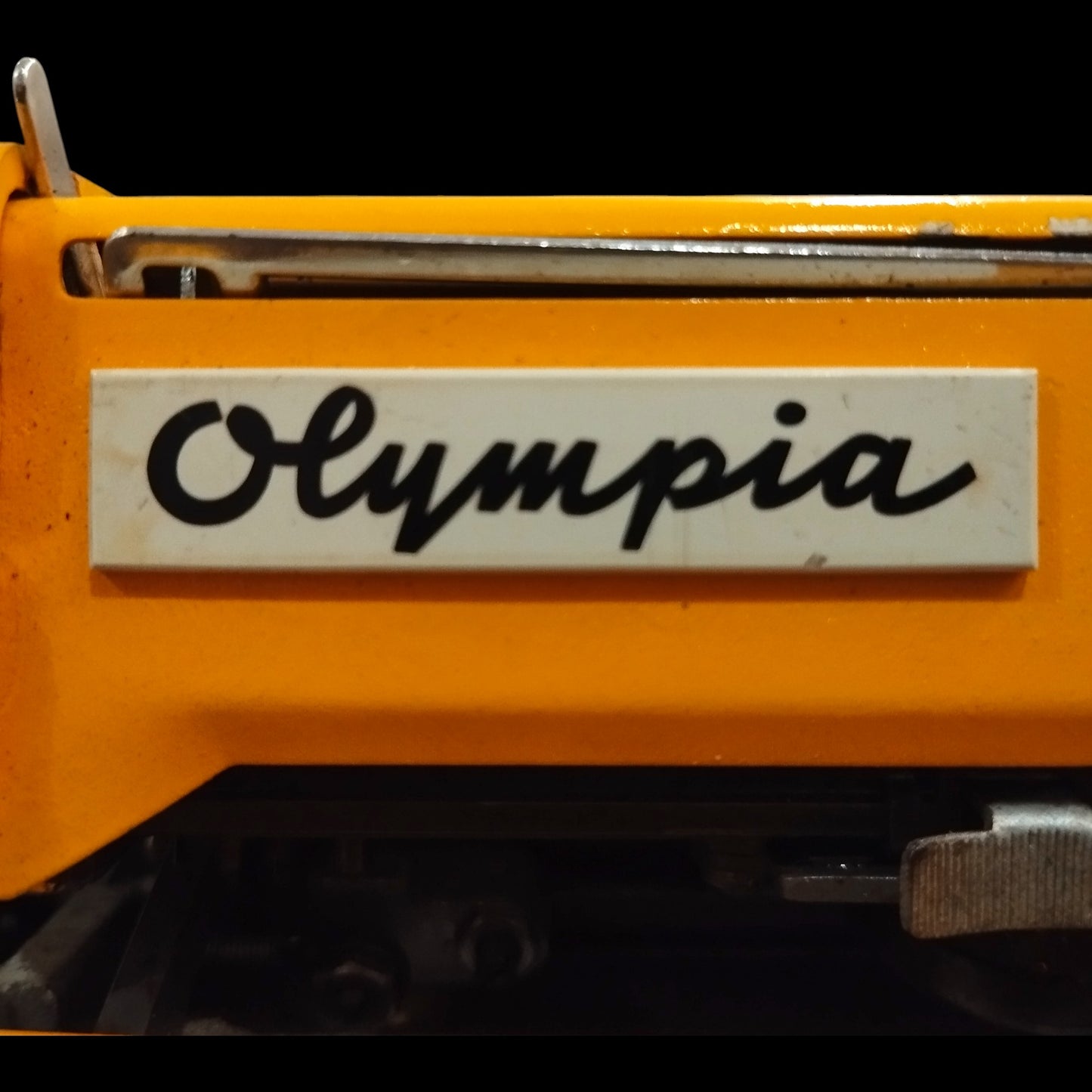 Image of Olympia Traveller De Luxe Typewriter. Available from universaltypewritercompany.in