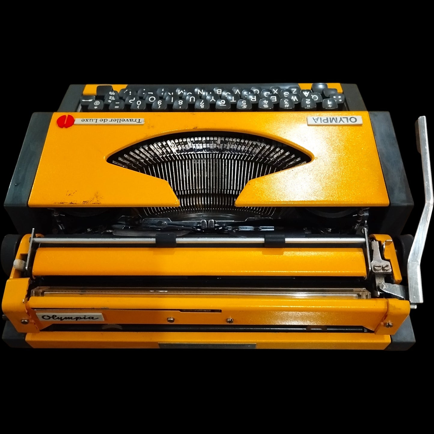 Image of Olympia Traveller De Luxe Typewriter. Available from universaltypewritercompany.in