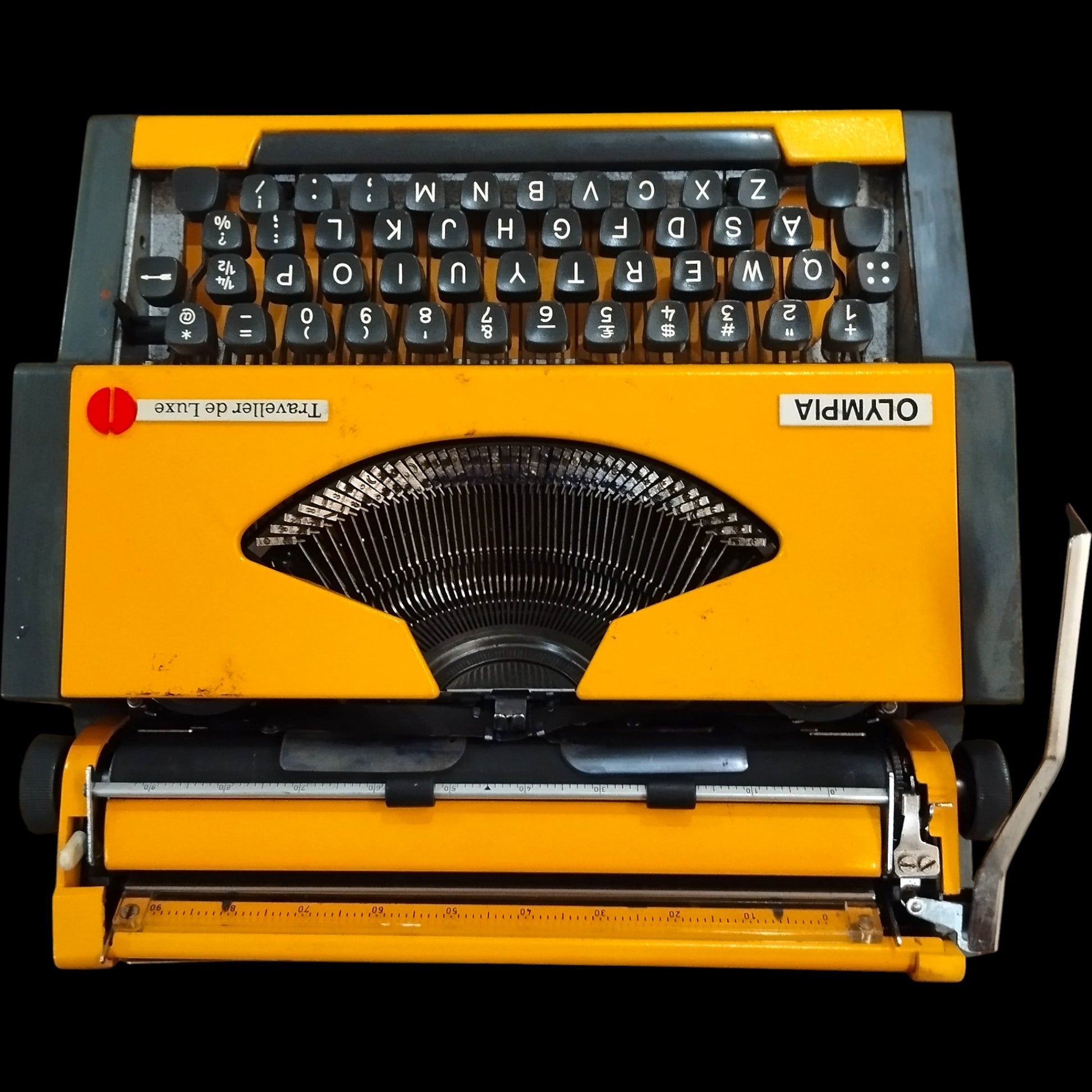 Image of Olympia Traveller De Luxe Typewriter. Available from universaltypewritercompany.in