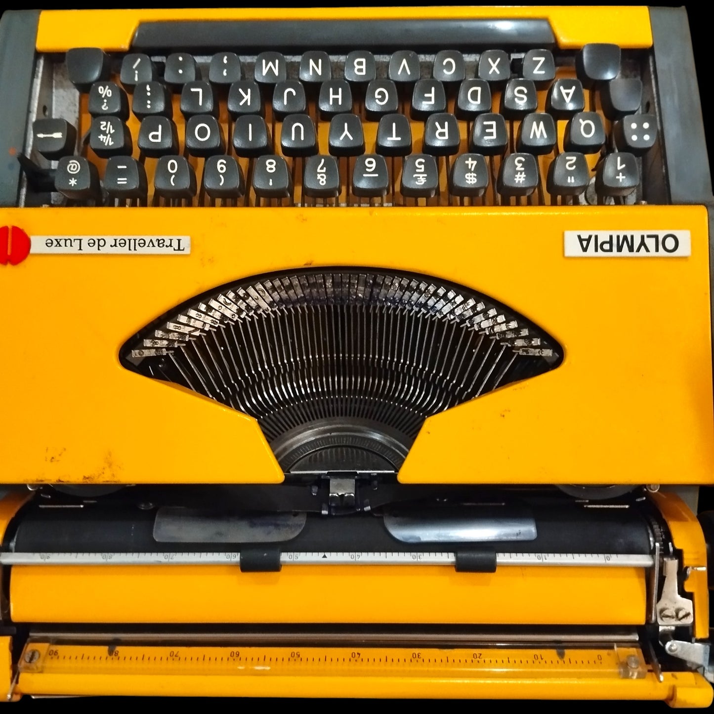 Image of Olympia Traveller De Luxe Typewriter. Available from universaltypewritercompany.in