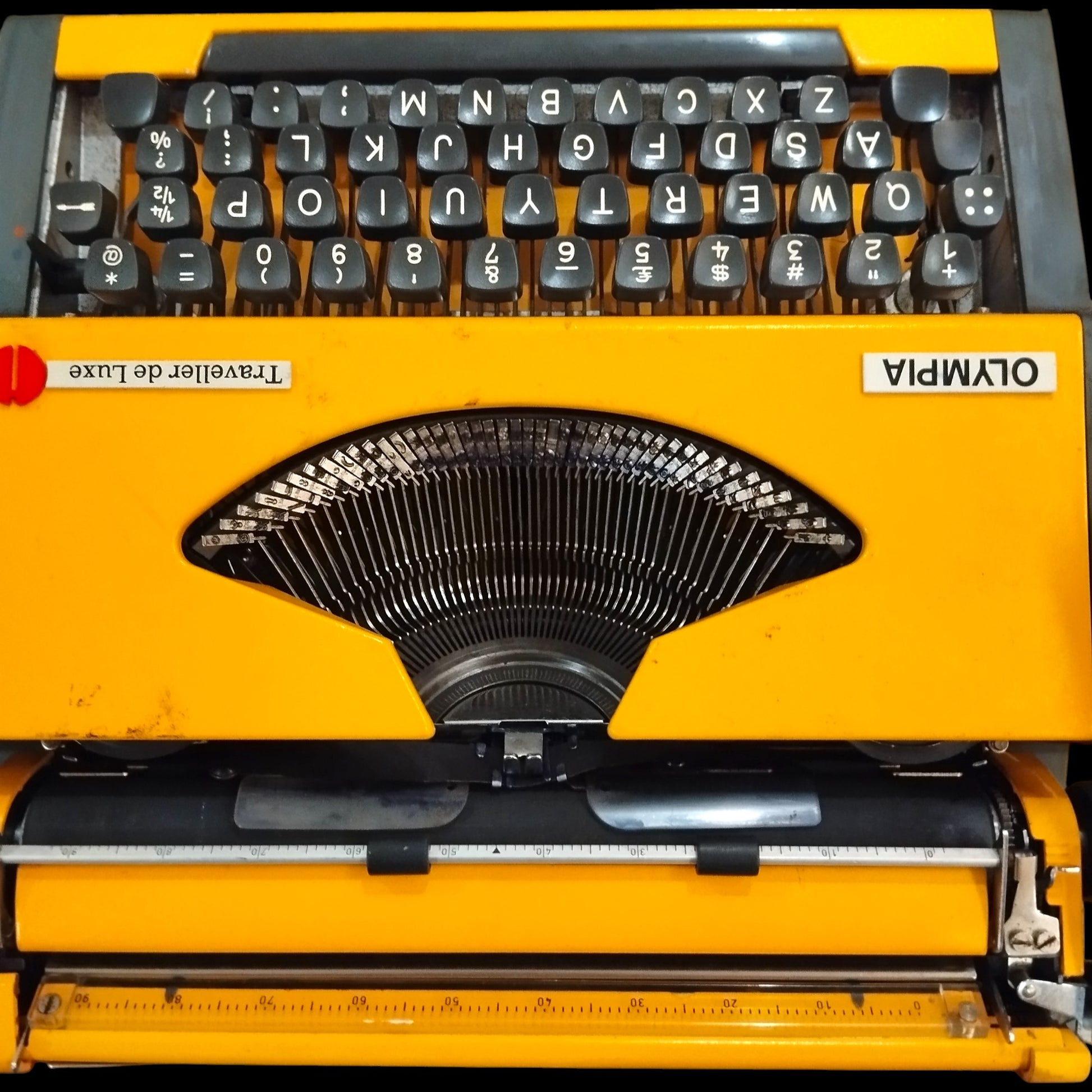Image of Olympia Traveller De Luxe Typewriter. Available from universaltypewritercompany.in