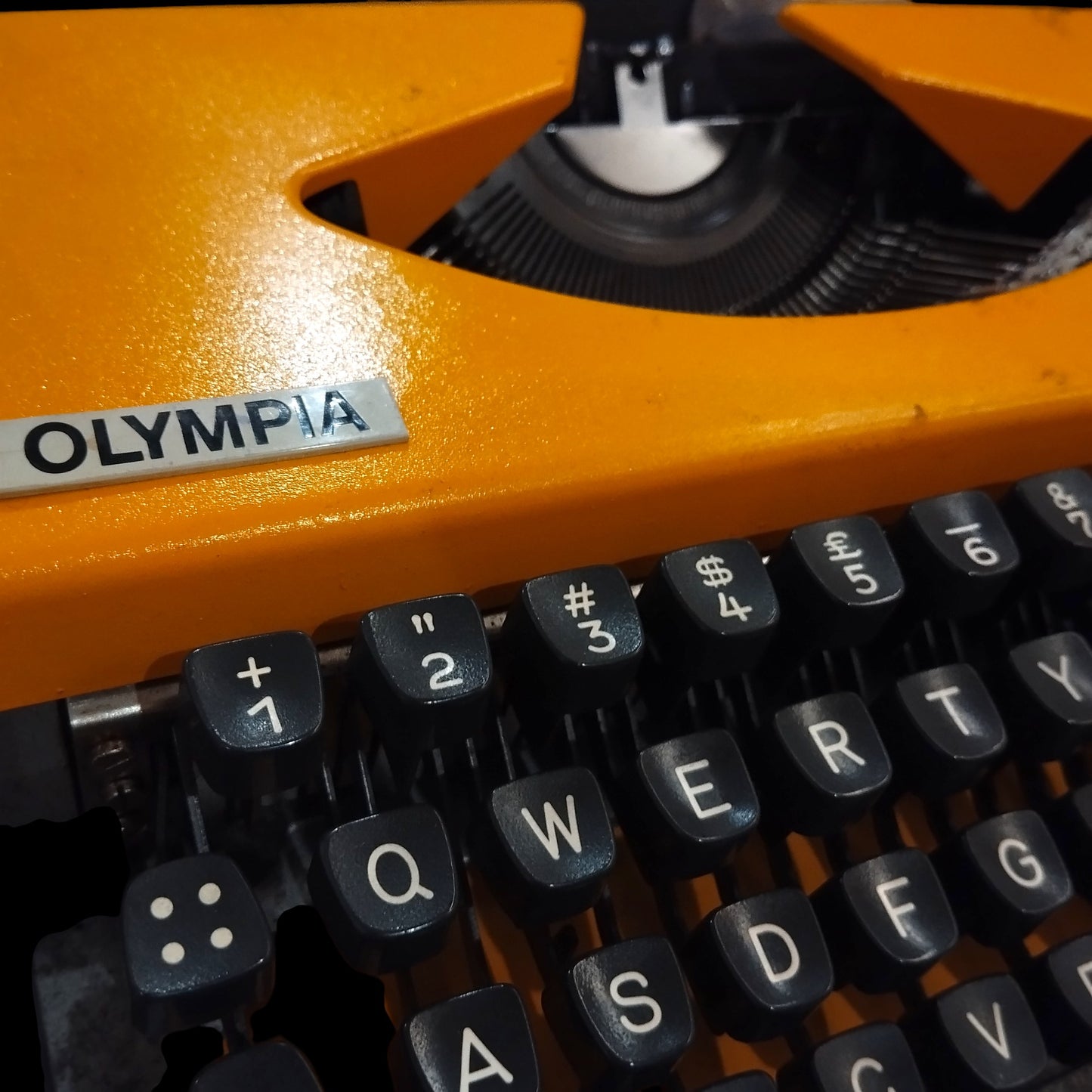 Image of Olympia Traveller De Luxe Typewriter. Available from universaltypewritercompany.in