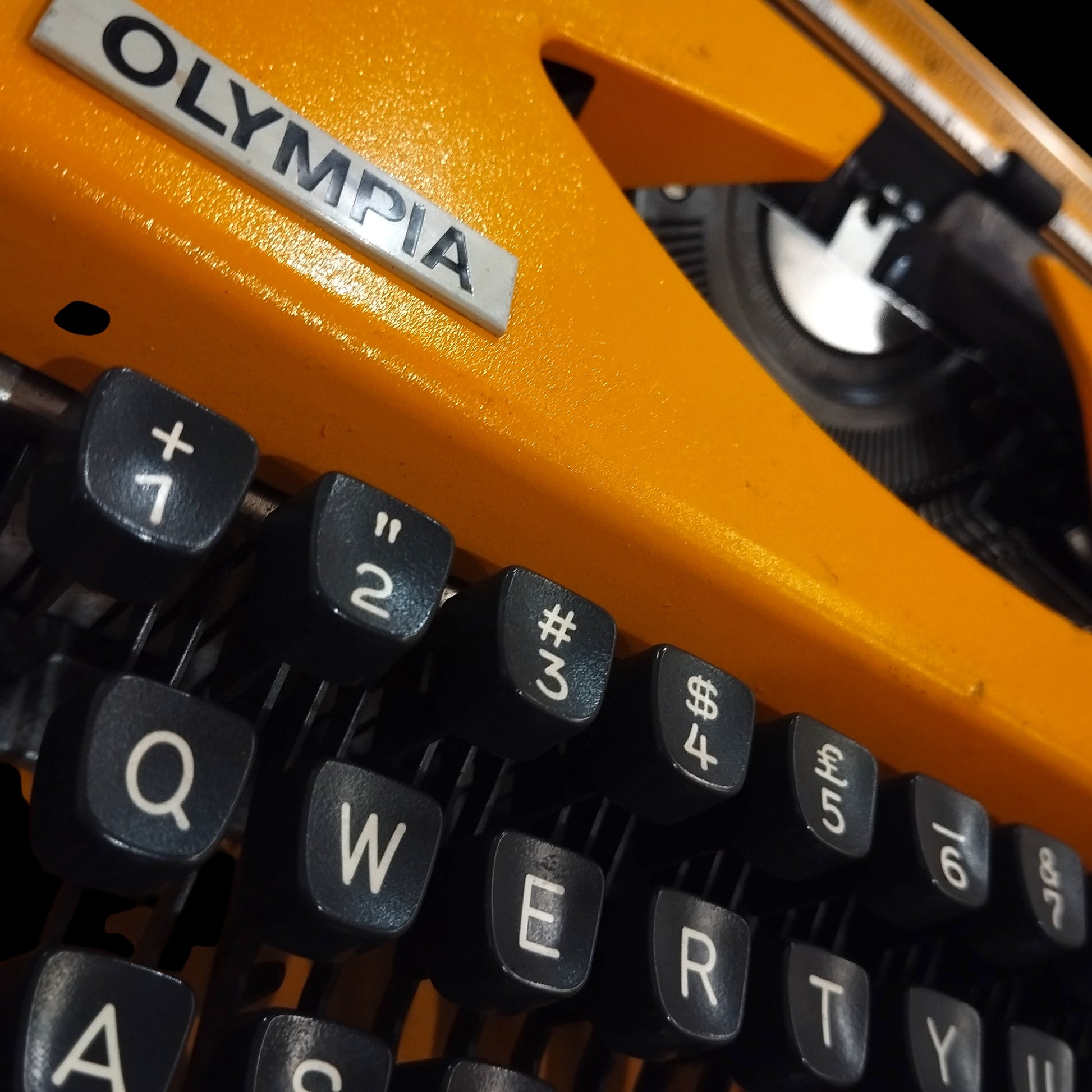Image of Olympia Traveller De Luxe Typewriter. Available from universaltypewritercompany.in