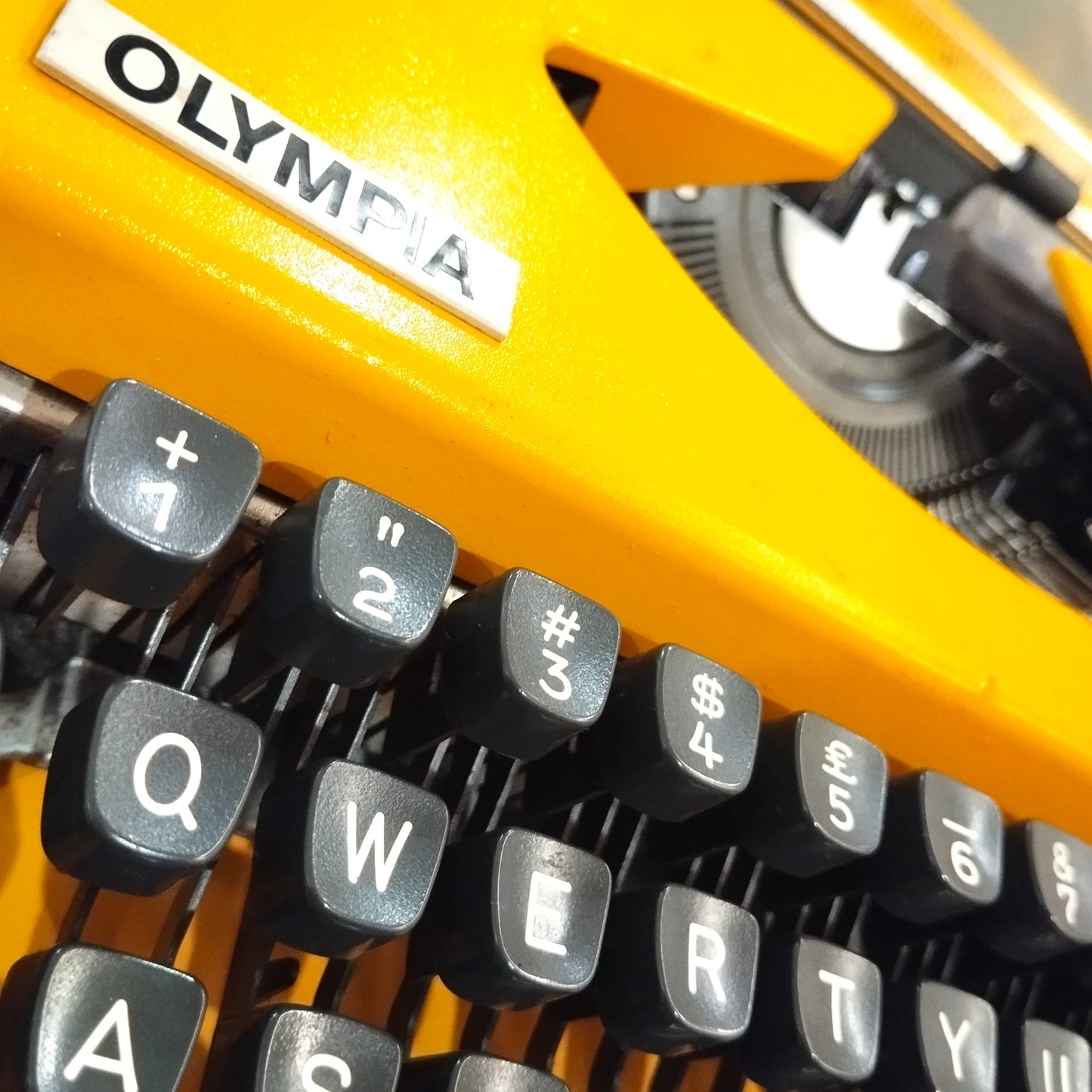 Image of Olympia Traveller De Luxe Typewriter. Available from universaltypewritercompany.in