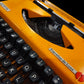 Image of Olympia Traveller De Luxe Typewriter. Available from universaltypewritercompany.in