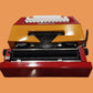 Image of Olivetti Lettera 25 Typewriter. Available at universaltypewritercompany.in