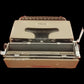Image of Olivetti Lettera 22 Typewriter. Available from universaltypewritercompany.in