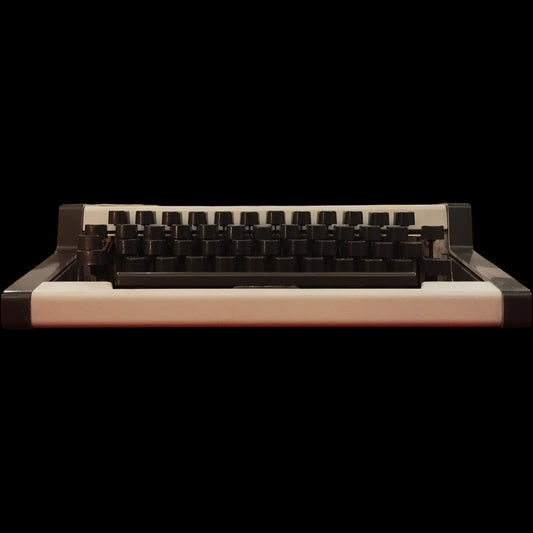 Image of Olympia Traveller Typewriter. Available from universaltypewritercompany.in
