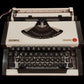 Image of Olympia Traveller Typewriter. Available from universaltypewritercompany.in