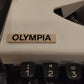 Image of Olympia Traveller Typewriter. Available from universaltypewritercompany.in