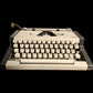 Image of Olympia Traveller de Luxe S Typewriter.
Available from universaltypewritercompany.in