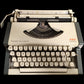 Image of Olympia Traveller de Luxe S Typewriter.
Available from universaltypewritercompany.in