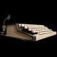 Image of Olympia Traveller de Luxe S Typewriter.
Available from universaltypewritercompany.in