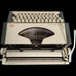 Image of Olympia Traveller de Luxe S Typewriter.
Available from universaltypewritercompany.in