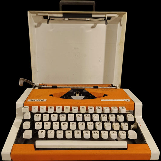 Image of Olympia Traveller De Luxe S Typewriter.
Available from universaltypewritercompany.in