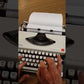 Typing Demonstration Video of Olympia Traveller de Luxe Typewriter. Available from universaltypewritercompany.in